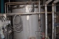 MIXING CHEST STAINLESS 125,000L TANK DRIVEN BY SEW GEAR MOTOR, WITH FOXBORO LIQUID LEVEL TRANSMITTER, BALL AND KNIFE GATE VALVES