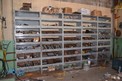 SHELVING WITH STAINLESS AND STEEL PIPE FITTINGS, VALVES