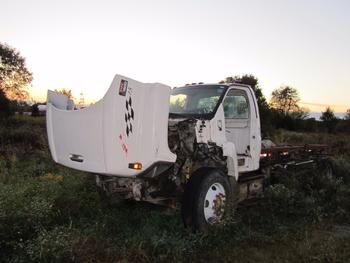 2000 And 5C 7500 Roll Off Truck