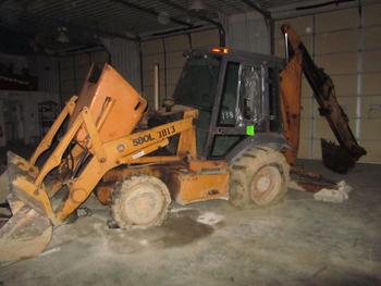 Case 580L Backhoe With Extend A Hoe And Cab And Four-Wheel-Drive