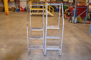 LOT OF 2 ASSORTED ROLLING LADDERS