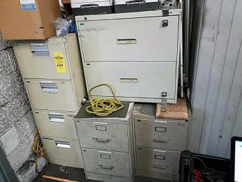 Set of four file cabinets in parts room