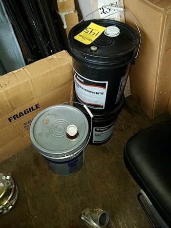 3 5 gallon buckets of hydraulic fluid
