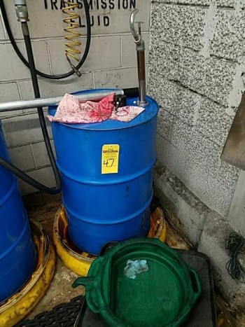 55-gallon drum and pump