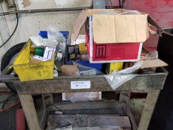 Cart with huge assortment screws bolts ect
