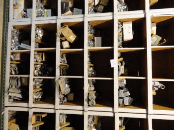Shelving w/contents: junction boxes, T&L connectors, struts, etc