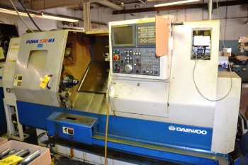 2001 Daewoo CNC Lathe with Space Saver 2100 S/N 23MSQ178 Model Puma 230 MS