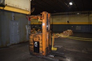 2,300 lb Clark Electric Stand up Fork lift