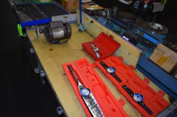 Lot of Proto Dial Torque Wrenches, One table mount Grinder, Metal work table