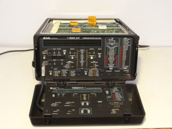 TTC T-Berd 310 Communications Analyzer With 310-1 DS1/DS0 & (10) Options