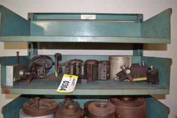 SHELF OF ASSORTED MACHINE PARTS