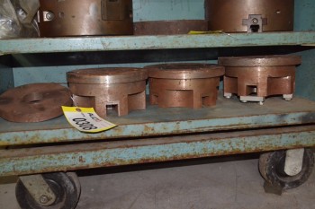 SHELF OF ASSORTED MACHINE PARTS
