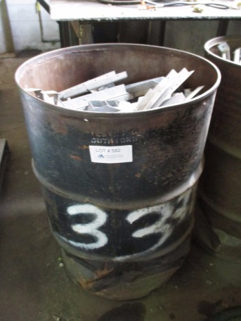 55 Gallon drum full of Joist hanging brackets