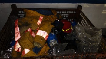 LOT OF ASSORTED FIRE PROTECTION EQUIPMENT, HARD HATS, JACKETS, EXTINGUISHERS