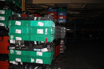 38 pallets of plastic storage bins