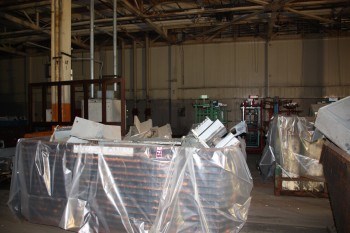 Misc. gondolas of air conditioners scrap parts, bins of pipe fittings