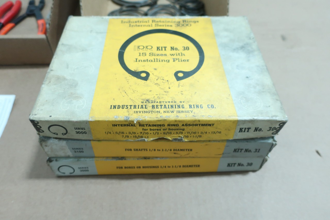 ASSORTED SET OF SNAP RING (CIRCLIP) PLIERS AND RETAINING RINGS.