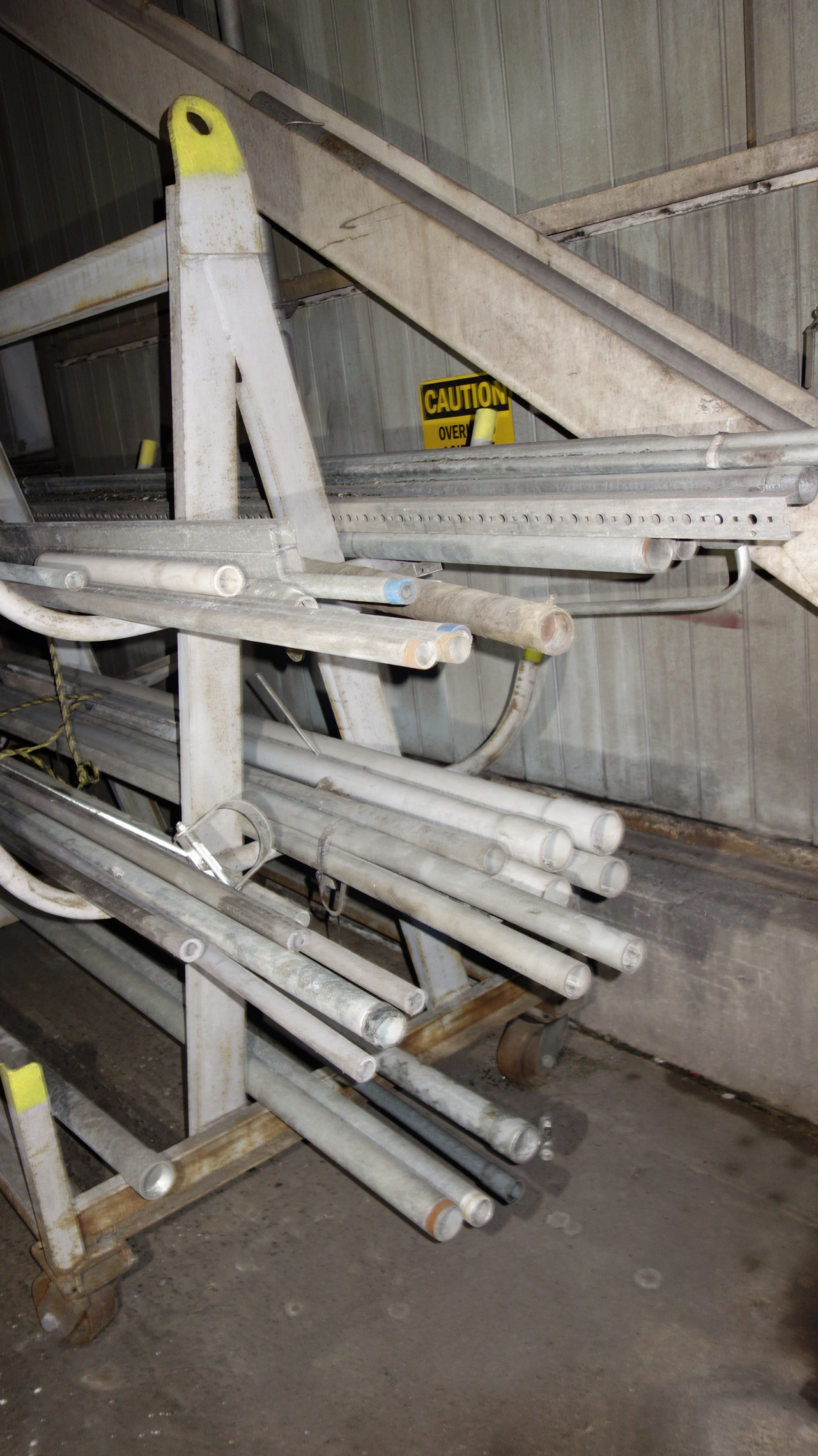 ASSORTED STEEL AND PVC PIPE WITH A-FRAME RACKING